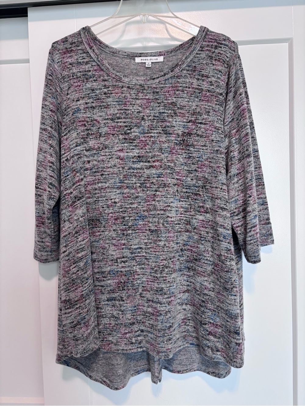 Rose & Olive Heathered Pullover Top bottoms in back